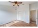 Bedroom with double closet and wood floors at 13730 Lensdale Ln, Windermere, FL 34786
