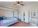 Main bedroom with a large bed and closet at 13730 Lensdale Ln, Windermere, FL 34786
