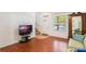 Living room with hardwood floors and lots of natural light at 13730 Lensdale Ln, Windermere, FL 34786