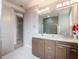 Modern bathroom with double vanity and walk-in shower at 141 Oakwood Way, Winter Park, FL 32789