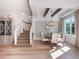 Light-filled dining area with hardwood floors and modern chandelier at 141 Oakwood Way, Winter Park, FL 32789