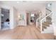 Hardwood floor hallway with stairs and bedroom view at 141 Oakwood Way, Winter Park, FL 32789