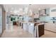 Modern kitchen with an island and stainless steel appliances at 141 Oakwood Way, Winter Park, FL 32789