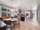 Kitchen breakfast nook with round table and built-in bench seating at 141 Oakwood Way, Winter Park, FL 32789
