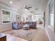 Bright living room featuring hardwood floors and comfortable seating at 141 Oakwood Way, Winter Park, FL 32789