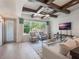 Light-filled living area with hardwood floors and stylish furniture at 141 Oakwood Way, Winter Park, FL 32789