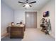 Home office with large desk and built-in shelving at 141 Oakwood Way, Winter Park, FL 32789