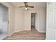 Bedroom featuring wood-look flooring and a sliding glass door at 144 Reserve Cir # 112, Oviedo, FL 32765