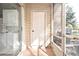The downstairs lanai has a washer and dryer, with a view of the pond at 144 Reserve Cir # 112, Oviedo, FL 32765