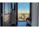 Bedroom with floor to ceiling windows and city views at 155 S Court Ave # 2415, Orlando, FL 32801