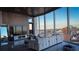 Modern living room with floor to ceiling windows and city views at 155 S Court Ave # 2415, Orlando, FL 32801