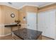 Kitchen features granite countertop and wooden cabinets at 15938 Green Cove Blvd, Clermont, FL 34714