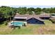Aerial view showing home, pool, and large backyard at 1877 Crowley E Cir, Longwood, FL 32779