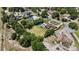 Aerial view of a home with a pool and expansive backyard in a quiet neighborhood at 1877 Crowley E Cir, Longwood, FL 32779