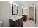 Double vanity bathroom with updated fixtures and flooring at 1877 Crowley E Cir, Longwood, FL 32779