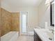 Bathroom with tile flooring, bathtub, and modern vanity at 1877 Crowley E Cir, Longwood, FL 32779