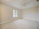 Bright bedroom with window, ceiling fan, and carpeting at 1877 Crowley E Cir, Longwood, FL 32779