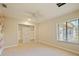 Bedroom with large closet and window with blinds at 1877 Crowley E Cir, Longwood, FL 32779