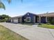 Stunning curb appeal with a three-car garage at 1877 Crowley E Cir, Longwood, FL 32779