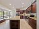 Open kitchen with granite island and stainless steel appliances at 1877 Crowley E Cir, Longwood, FL 32779