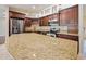 Kitchen with granite countertop and dark wood cabinets at 1877 Crowley E Cir, Longwood, FL 32779