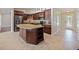 Kitchen with granite island and stainless steel appliances at 1877 Crowley E Cir, Longwood, FL 32779