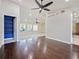 Spacious living area with hardwood floors and ceiling fan at 1877 Crowley E Cir, Longwood, FL 32779