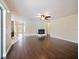 Spacious living area with hardwood floors and fireplace at 1877 Crowley E Cir, Longwood, FL 32779