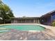 View of a refreshing kidney-shaped pool with spa next to a screened enclosure at 1877 Crowley E Cir, Longwood, FL 32779