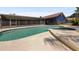 Relaxing kidney-shaped pool and spa, adjacent to a screened patio at 1877 Crowley E Cir, Longwood, FL 32779