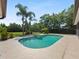 Beautiful kidney-shaped pool and spa, perfect for relaxation and entertainment at 1877 Crowley E Cir, Longwood, FL 32779