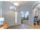 Bright entryway with tile floors and views into the living room at 2048 Gloria Oak Ct, Orlando, FL 32820