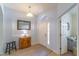 Entryway featuring a wooden console table and mirror at 2048 Gloria Oak Ct, Orlando, FL 32820