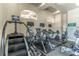 Variety of equipment in the fitness center, with treadmills, ellipticals, and weights for a full workout at 2048 Gloria Oak Ct, Orlando, FL 32820