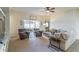 Living room with two armchairs and a sofa at 2048 Gloria Oak Ct, Orlando, FL 32820
