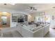 Spacious living room features a comfy sectional sofa, built-in shelving, and access to the backyard at 2048 Gloria Oak Ct, Orlando, FL 32820