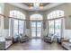 Relaxing lounge area with comfortable seating, natural light, and elegant decor at 2048 Gloria Oak Ct, Orlando, FL 32820