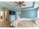 Main bedroom with large bed and view of bathroom at 2048 Gloria Oak Ct, Orlando, FL 32820