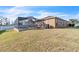 Home with fenced-in pool and screened enclosure at 245 Viola Dr, Auburndale, FL 33823