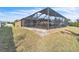 Private backyard oasis with screened pool at 245 Viola Dr, Auburndale, FL 33823