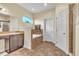 Relaxing bathroom with soaking tub and walk-in shower at 245 Viola Dr, Auburndale, FL 33823