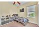 Bright bedroom with twin bed and storage at 245 Viola Dr, Auburndale, FL 33823