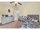 Bedroom with twin bed, dresser, and closet at 245 Viola Dr, Auburndale, FL 33823