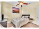 Cozy bedroom with a double bed, city view, and a convenient nightstand at 245 Viola Dr, Auburndale, FL 33823