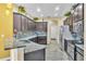 Modern kitchen with granite countertops and dark wood cabinets at 245 Viola Dr, Auburndale, FL 33823