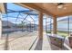Inviting screened pool area with patio and fire pit for outdoor enjoyment at 245 Viola Dr, Auburndale, FL 33823