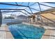 Beautiful screened-in pool with a spacious deck for sunbathing at 245 Viola Dr, Auburndale, FL 33823