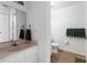 A simply styled bathroom with updated floors and a matching sink and countertop at 2622 Lodi Cir # 103, Kissimmee, FL 34746