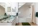 Well-lit bathroom with a glass bowl sink and shower at 2622 Lodi Cir # 103, Kissimmee, FL 34746