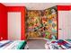 Bright bedroom with two twin beds, themed decor, and an open closet at 2622 Lodi Cir # 103, Kissimmee, FL 34746